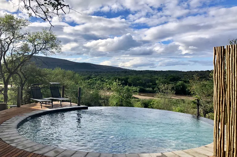 Mthembu Lodge swimming pool overlooking Mfolozi
