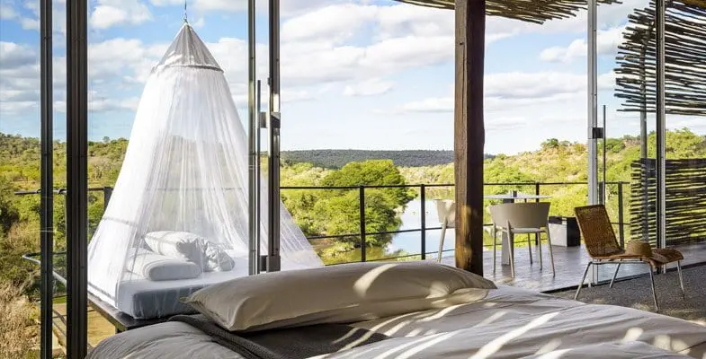 Singita Lebombo suites leading onto a private deck and daybed