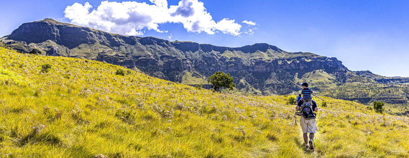 Walk Beneath Giant Mountain Peaks